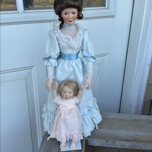 Porcelain Mother and Child Dolls in Blue and Pink Dresses